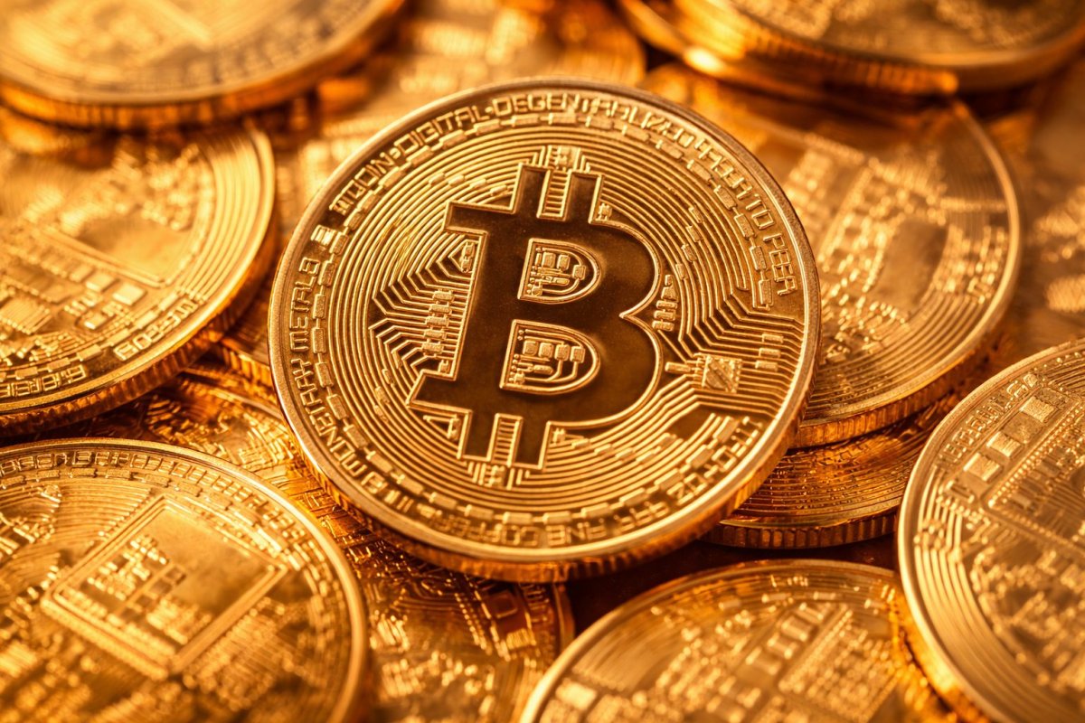 Bitcoin Retreats Under $70K Amid Exchange Mishap and U.S. Data Watch