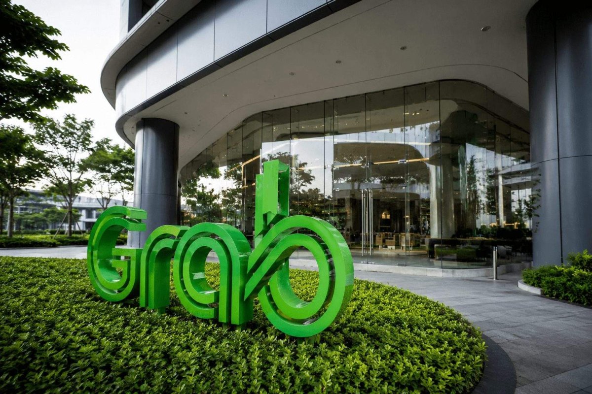 Grab Shares Rise Ahead of Indonesia Commission Cut; Buyback Supports