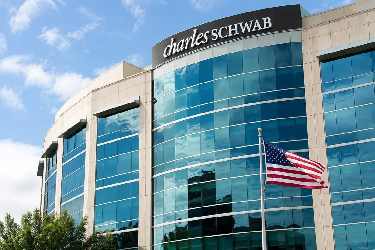 Schwab Stock Gains on Record May Metrics Amid AI and Crypto Headwinds