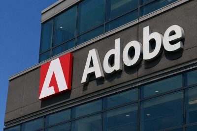 Adobe Rises Despite BofA's Underperform Rating Amid $25B Buyback