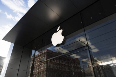 Apple Stock Breaks $300 Barrier as Market Eyes Services and AI Growth