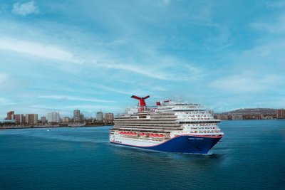 Carnival Shares Dip Ahead of Q3 Report; Search for Missing Passenger Halted