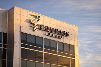 Compass Group Shares Hover Near Multi-Year Low Amid AI and Office Demand Concerns