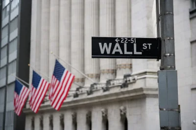 Dow Notches Record Close; Tech Falters in After-Hours Trading