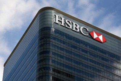 HSBC Sells Singapore Insurance Unit at 23x Earnings; Buyback Decision Looms