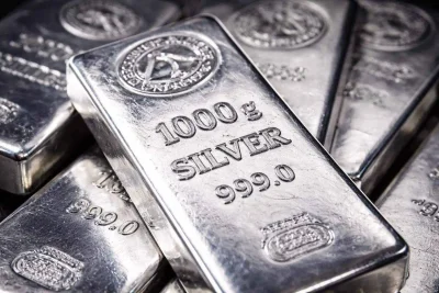 Silver Retreats Below $80 as Fed Decision Looms, Miners Slide
