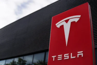 Tesla Shares Dip Despite Record Q2 Deliveries; Inventory Concerns Loom
