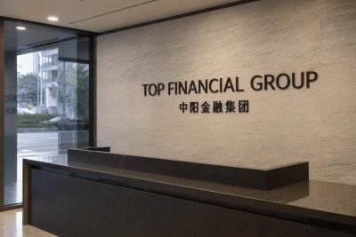 TOP Financial Stock Climbs 8.5% Despite Revenue Decline and Net Loss