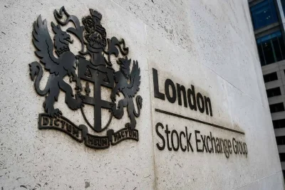 UK Stocks Recover on Bid Buzz and Falling Oil