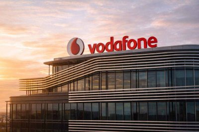 Vodafone Gains on €1bn Dutch Stake Sale and Share Buyback Program