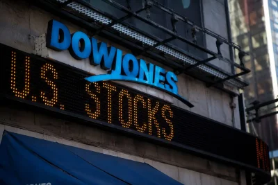 Wall Street Wavers: Dow Dips on Oil Surge, Inflation Jitters